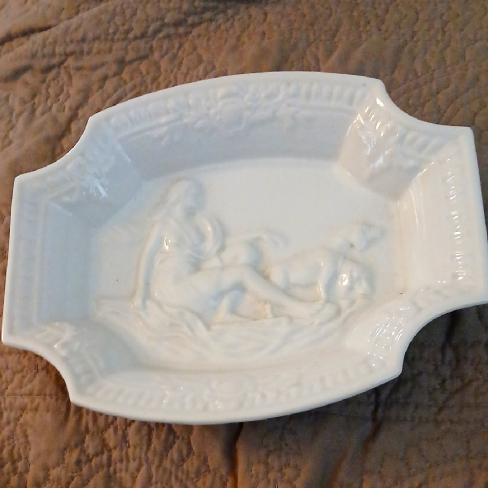 White Ceramic Accent Plate with Raised Relief Design